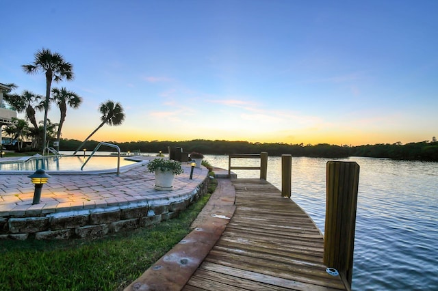 dock area with a water view