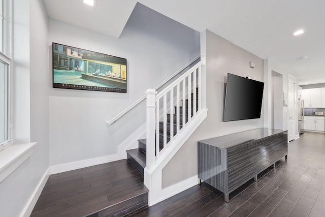 stairway with wood-type flooring