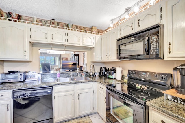 kitchen with sink, dark stone countertops, a textured ceiling, light tile patterned floors, and black appliances