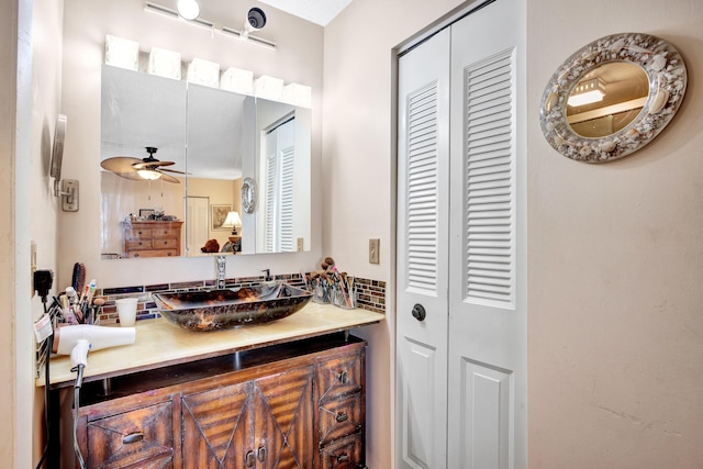 bathroom with vanity and ceiling fan