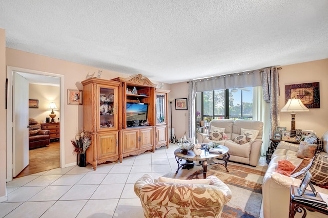 tiled living room with a textured ceiling