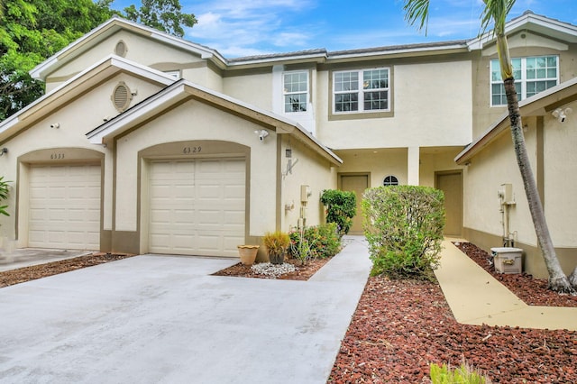 view of front of home with a garage