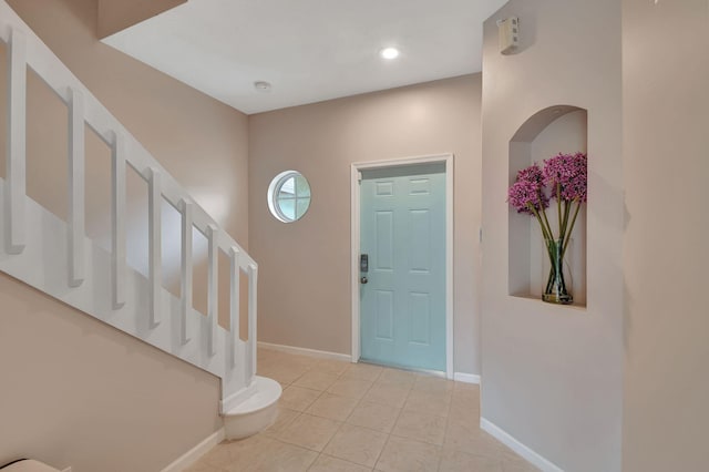 view of tiled foyer entrance