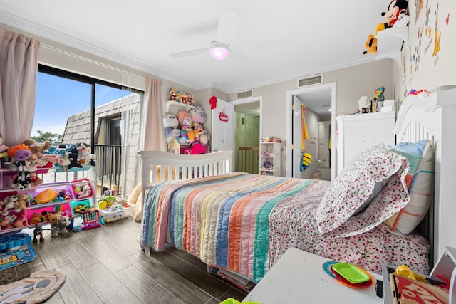 bedroom with ceiling fan, crown molding, and hardwood / wood-style flooring