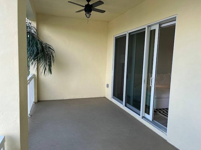 balcony featuring ceiling fan