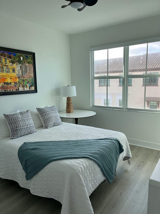 bedroom with light wood-type flooring