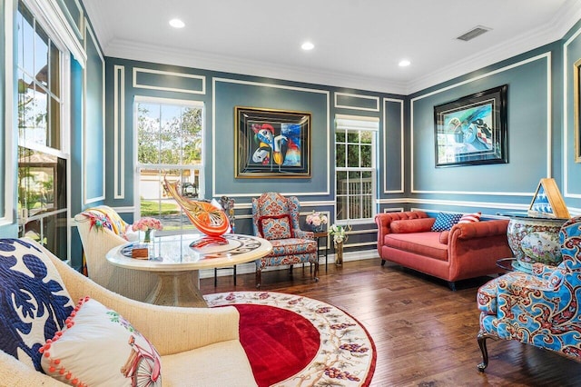 interior space featuring crown molding and dark hardwood / wood-style flooring