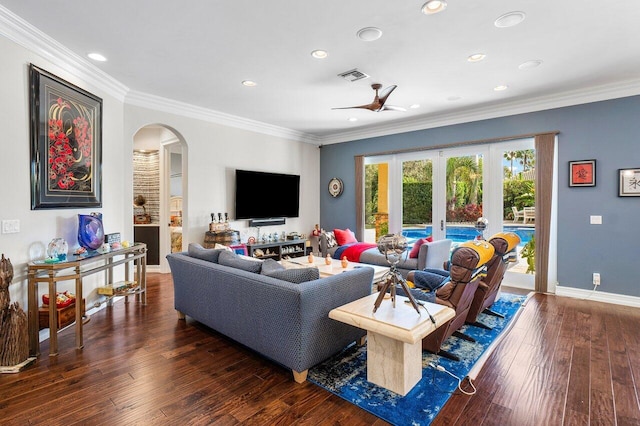 living room with dark hardwood / wood-style flooring, ceiling fan, french doors, and crown molding