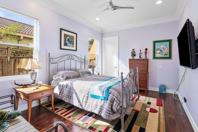 bedroom with multiple windows, ceiling fan, crown molding, and dark wood-type flooring