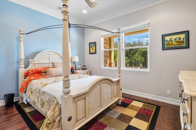 bedroom featuring ceiling fan, dark hardwood / wood-style floors, and crown molding