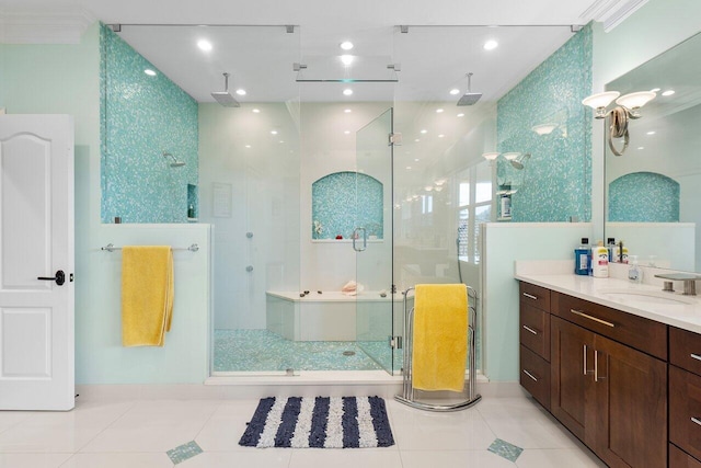 bathroom featuring tile patterned flooring, vanity, an enclosed shower, and ornamental molding