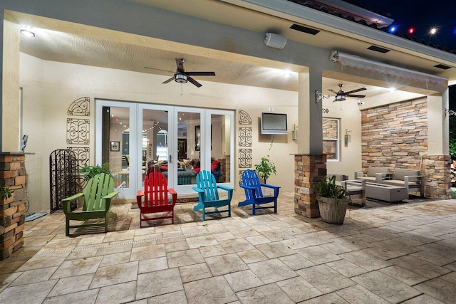 view of patio / terrace with ceiling fan and french doors