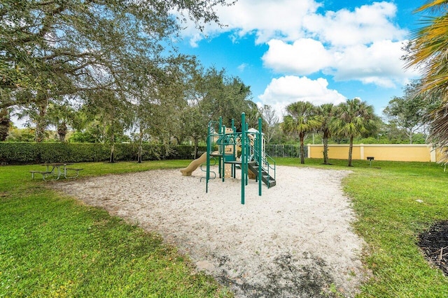 view of play area featuring a lawn