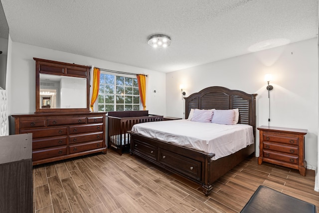 bedroom featuring a textured ceiling