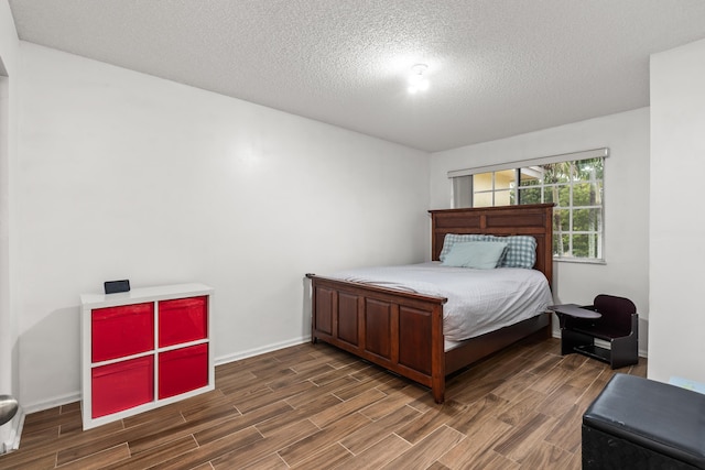 bedroom with a textured ceiling