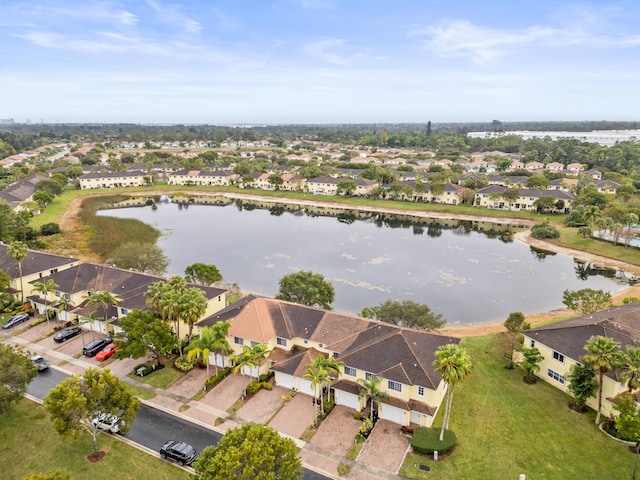 drone / aerial view with a water view