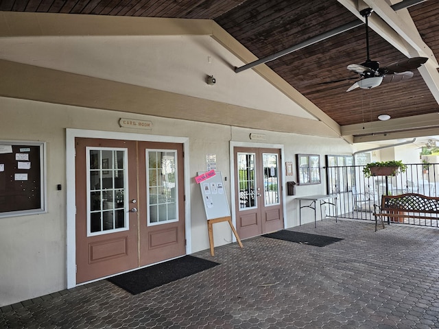 property entrance with ceiling fan and french doors