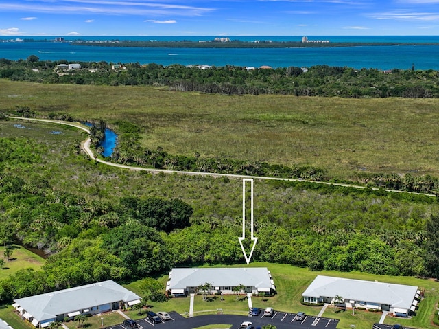 drone / aerial view featuring a water view