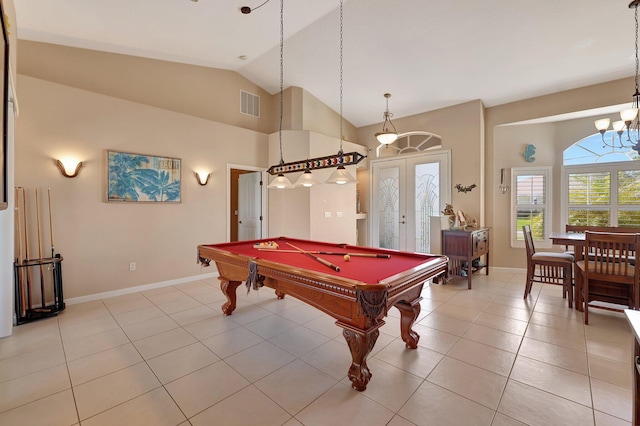 playroom with french doors, billiards, a chandelier, vaulted ceiling, and light tile patterned floors