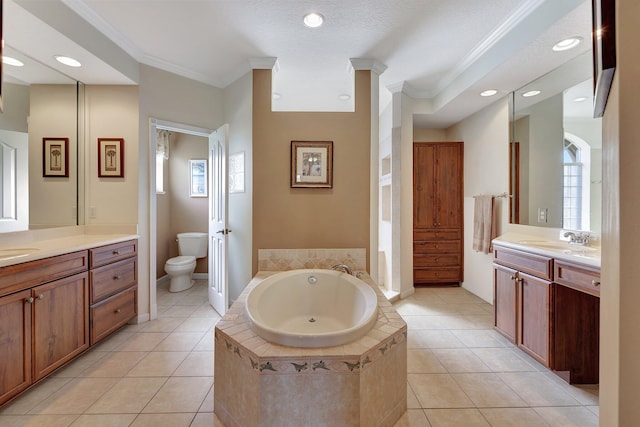 bathroom featuring toilet, tile patterned flooring, ornamental molding, and vanity