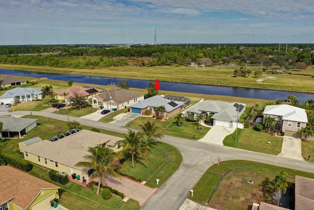 drone / aerial view featuring a water view