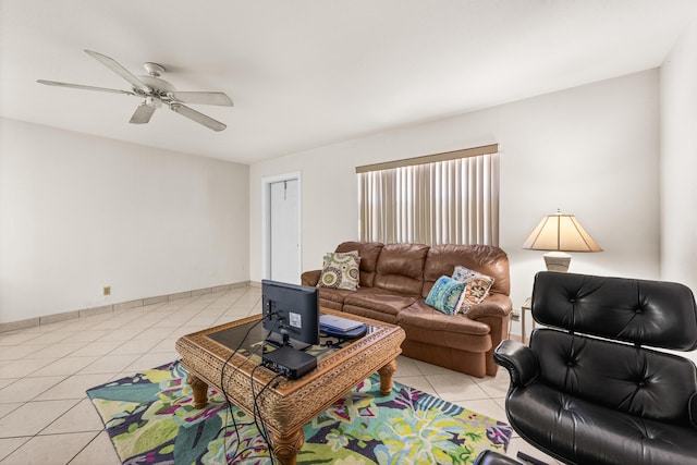 living room with light tile patterned floors and ceiling fan