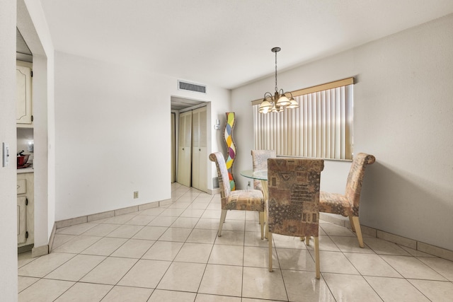 unfurnished dining area with light tile patterned flooring and a chandelier