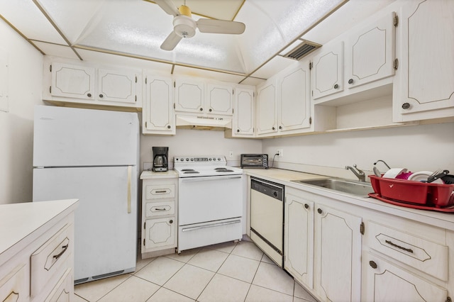 kitchen with white appliances, ceiling fan, sink, light tile patterned floors, and white cabinets