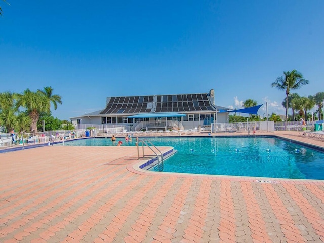 view of pool featuring a patio area