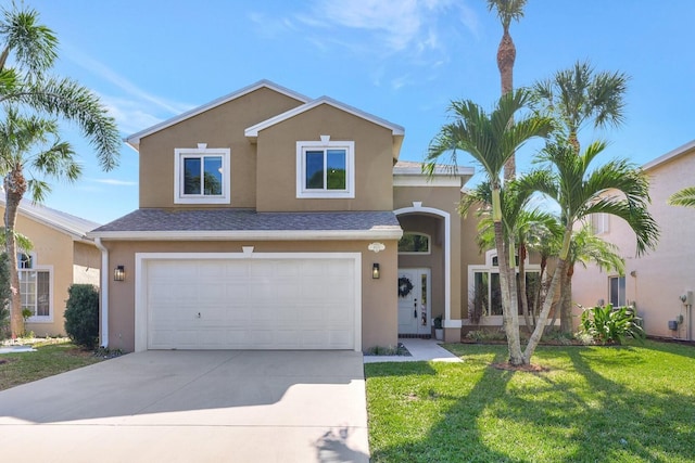 view of front facade featuring a front yard and a garage