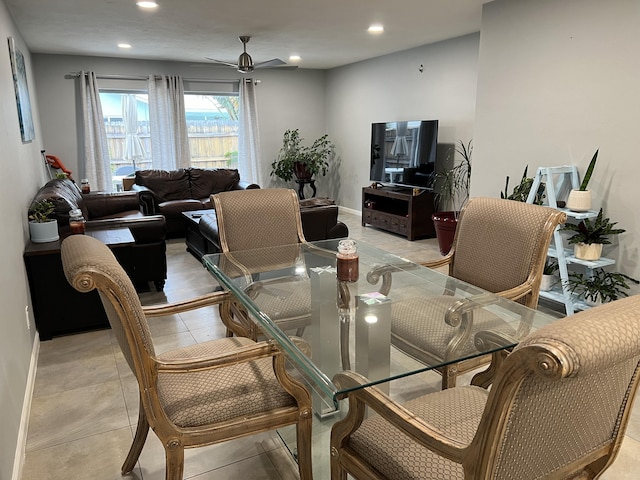 dining room with ceiling fan and light tile patterned floors