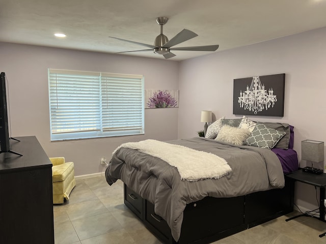 bedroom with ceiling fan and light tile patterned floors