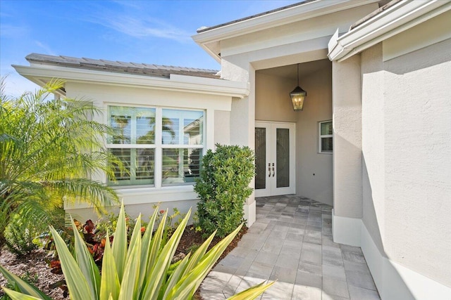 view of exterior entry with french doors