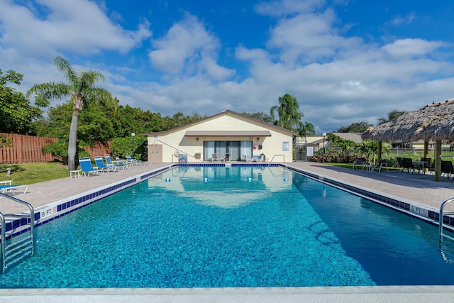 view of swimming pool featuring a patio