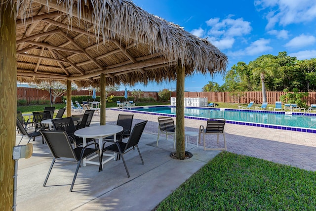 view of swimming pool with a gazebo and a patio