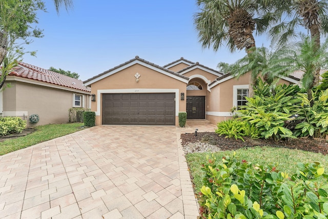 view of front of property with a garage