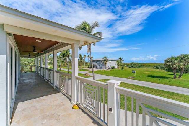 view of patio / terrace with a porch and ceiling fan