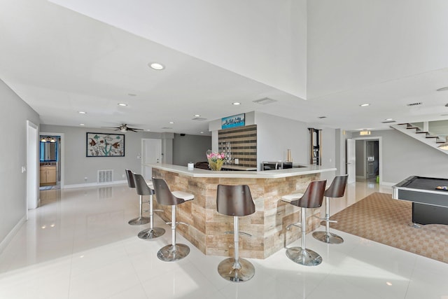 bar featuring pool table, ceiling fan, and light tile patterned flooring