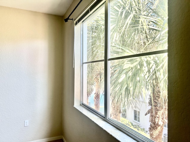 exercise room featuring a textured ceiling