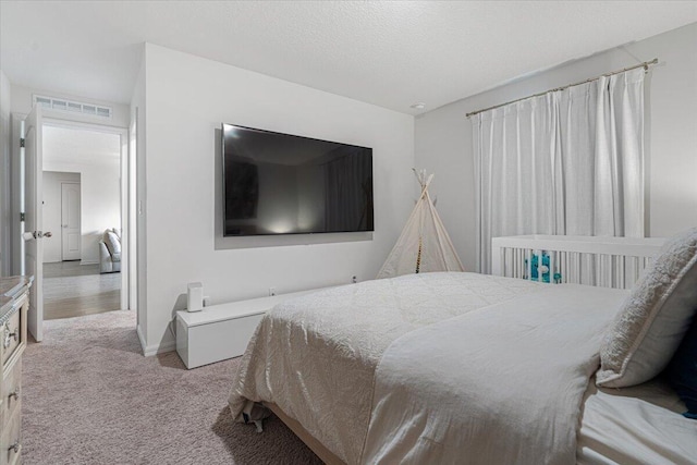 bedroom with light colored carpet