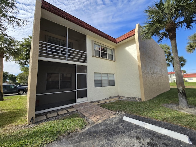 exterior space with a yard