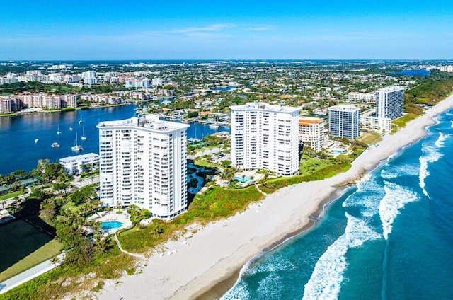 aerial view featuring a view of the beach and a water view