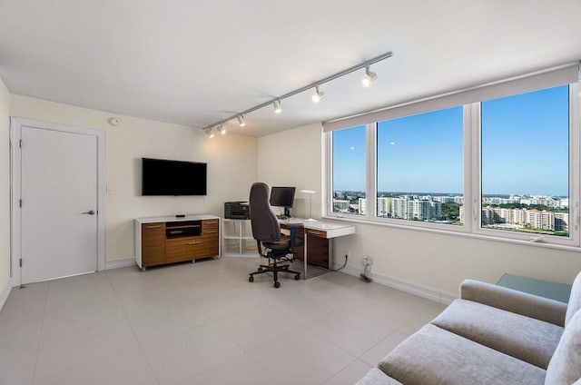 office area with light tile patterned floors