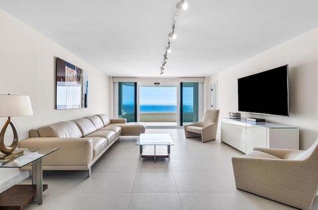 living room with floor to ceiling windows