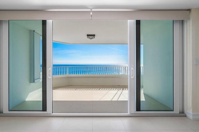 balcony featuring a water view