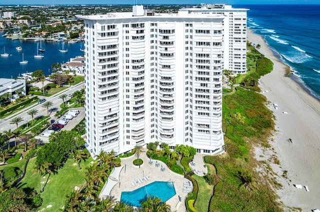 bird's eye view featuring a beach view and a water view