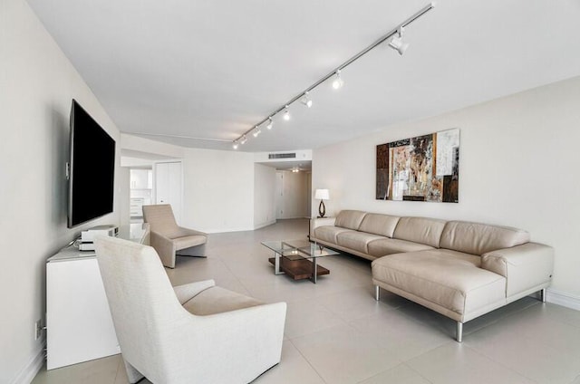 living room featuring light tile patterned floors