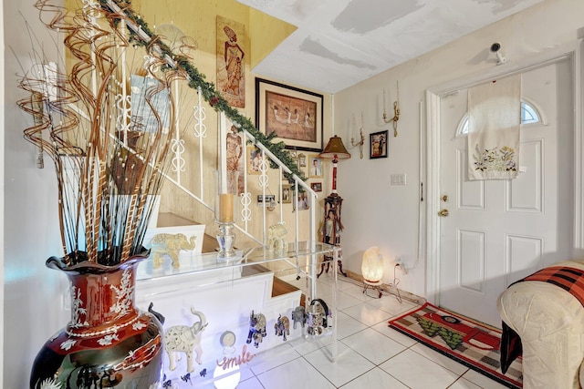 foyer with tile patterned flooring