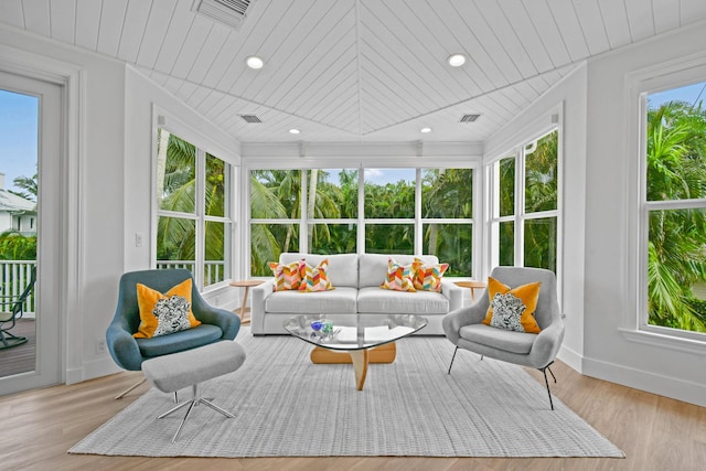 sunroom featuring wood ceiling