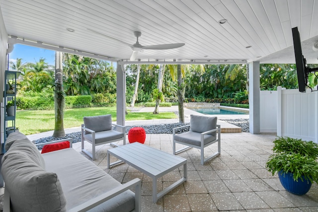 view of patio featuring ceiling fan and an outdoor living space